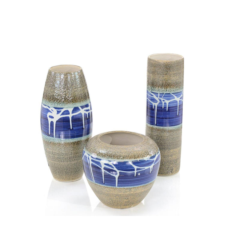 A Set Of Three Blue Dahlia Vases