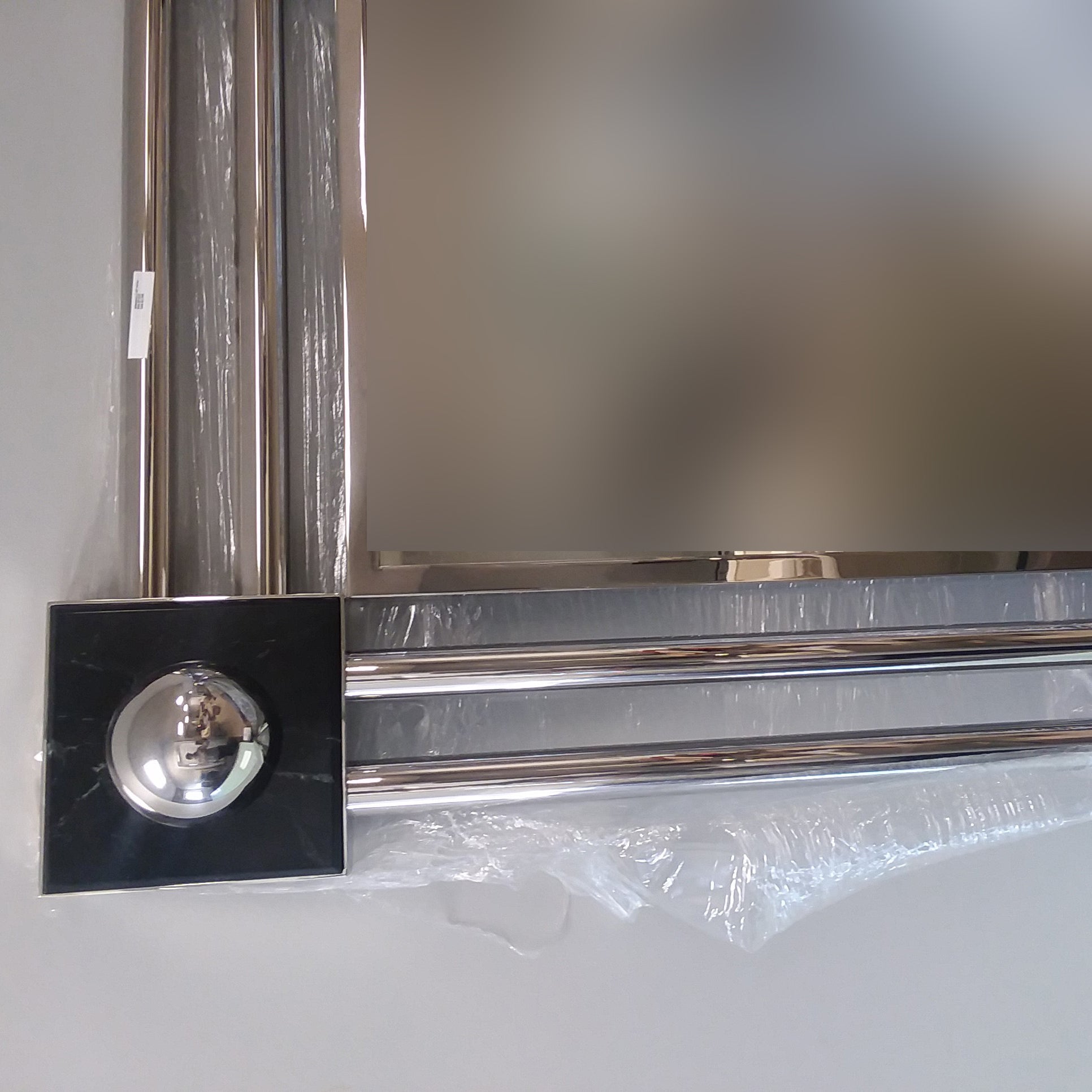 corner detail of stainless steel mirror